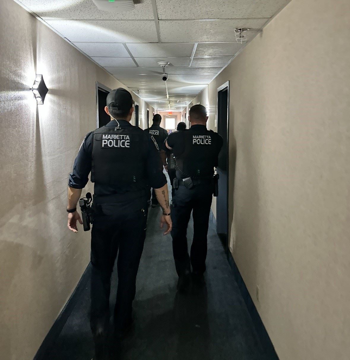 Officers in hallway