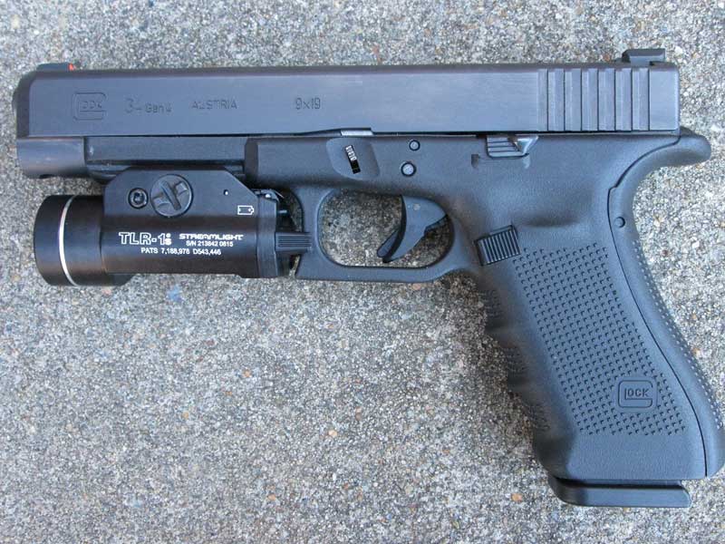 Glock 34 with tactical light (primary duty weapon)