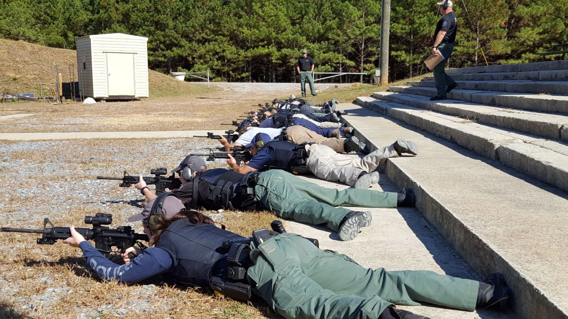 Officers lying on ground during rifle training